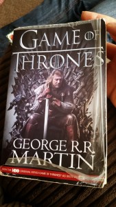 My copy (obviously well loved by the previous owner) of Book 1 of the Song of Ice and Fire - Game of thrones